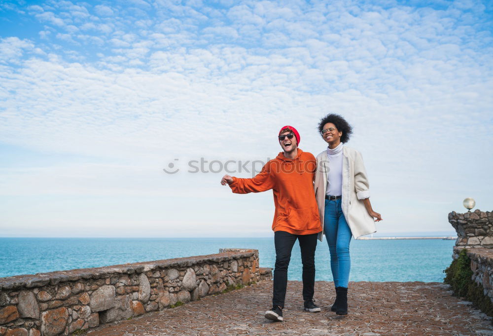 Similar – Image, Stock Photo Cheerful women posing at fence