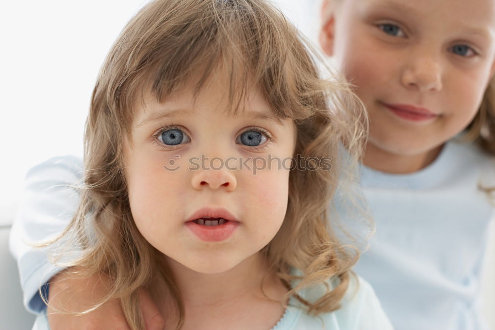 Similar – Image, Stock Photo two beautiful sisters playing at home