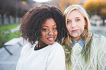 Similar – Beautiful women having fun in the street.