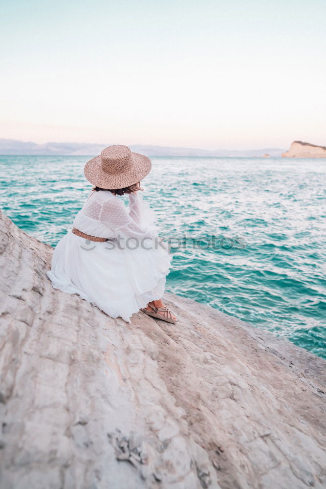 Similar – Woman posing at lake