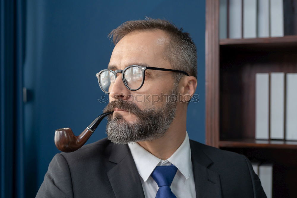 Similar – Determined man with glasses