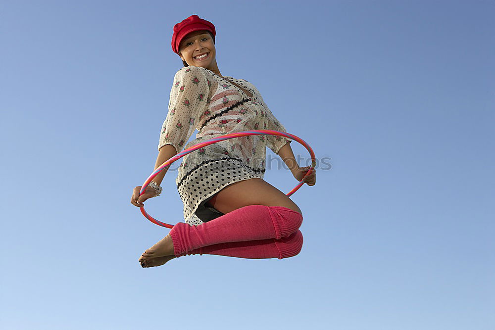 Similar – Woman with afro hair climbing by children’s attractions.