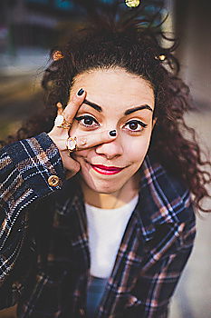 Image, Stock Photo Portrait of Young woman with many eyes