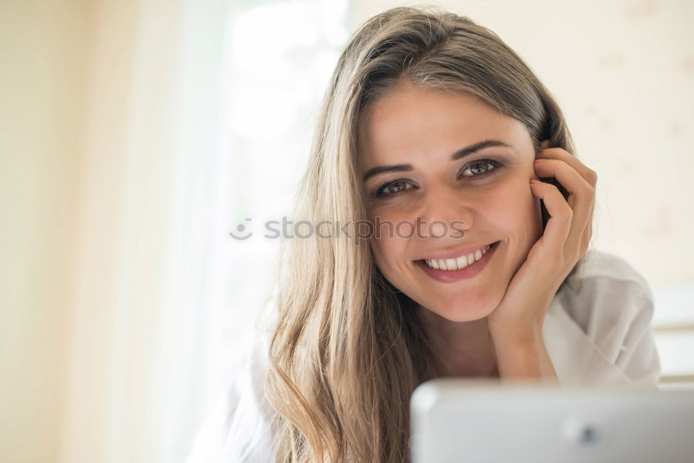 Similar – Image, Stock Photo Smiling African woman using digital tablet outdoors.