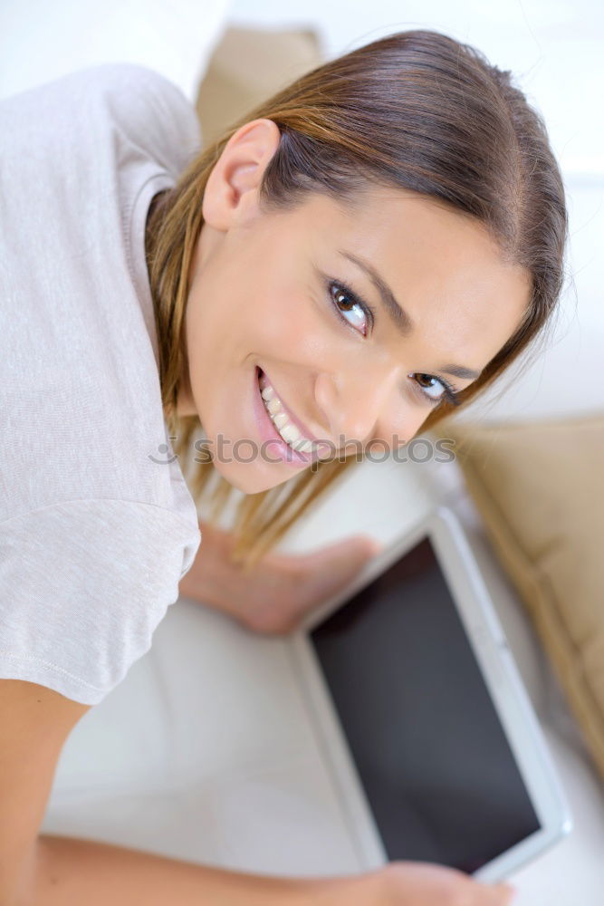 Similar – Image, Stock Photo Smiling African woman using digital tablet outdoors.