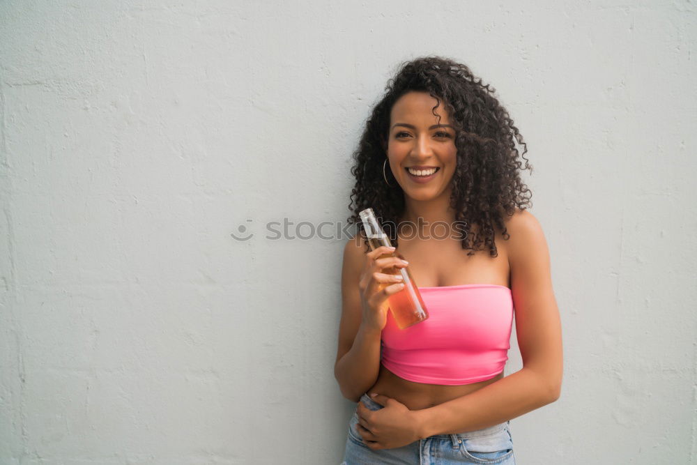 Image, Stock Photo African woman listening to music with earphones and smartphone