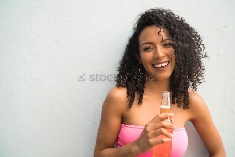 Similar – Portrait of a young black woman smiling with braces