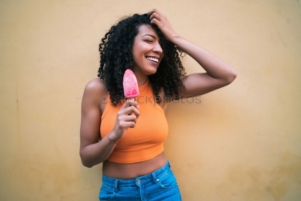 Similar – Portrait of young african woman stretching out tongue