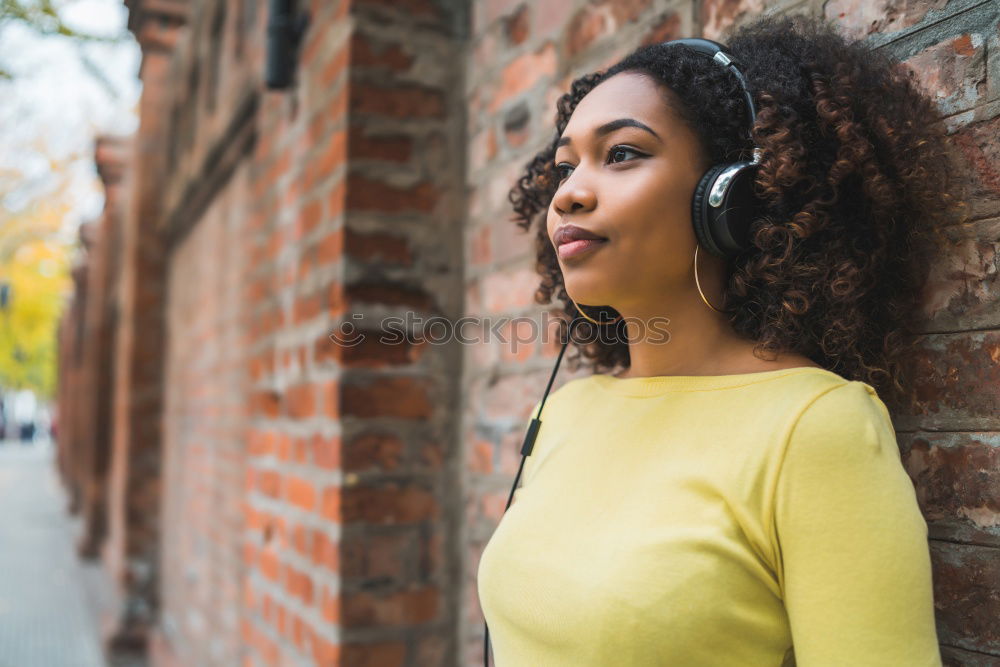 Similar – Gorgeous black woman in dress on street