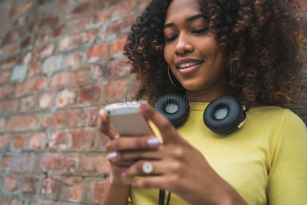 Similar – Happy caucasian women listening to music on smart phone