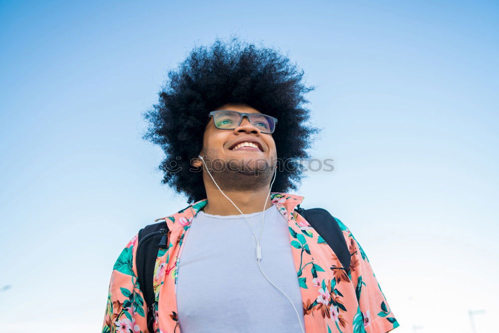 Similar – Woman with afro hair climbing by children’s attractions.