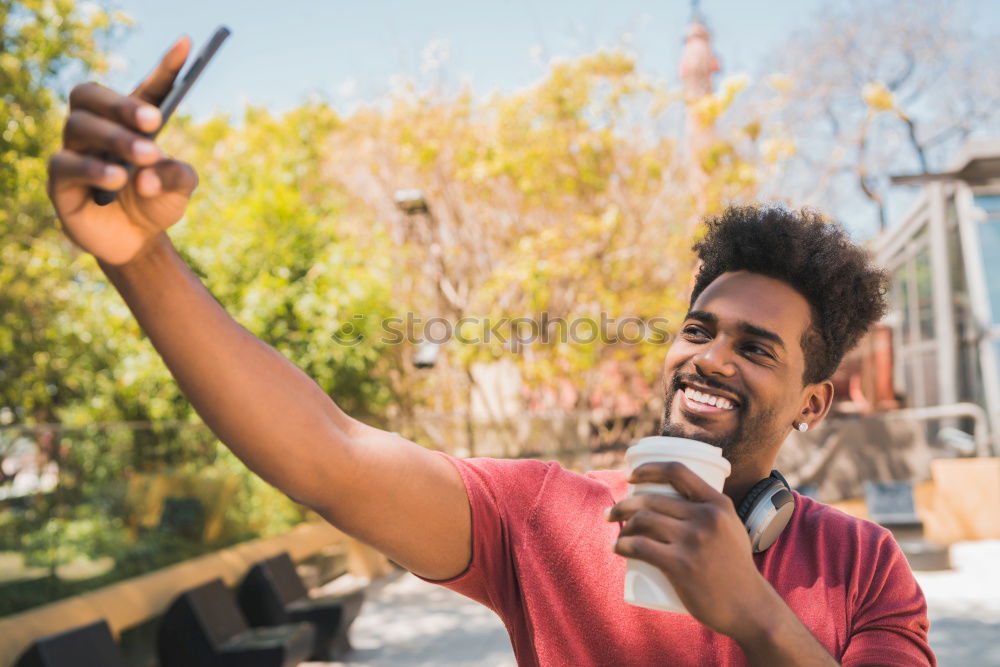 Similar – Image, Stock Photo Young black man using smart phone outdoors