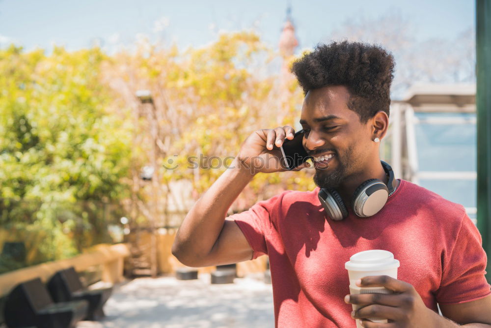 Similar – Young handsome black man holds a ice cream cone