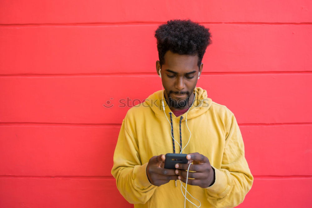 Similar – Image, Stock Photo Afro young man using mobile phone.