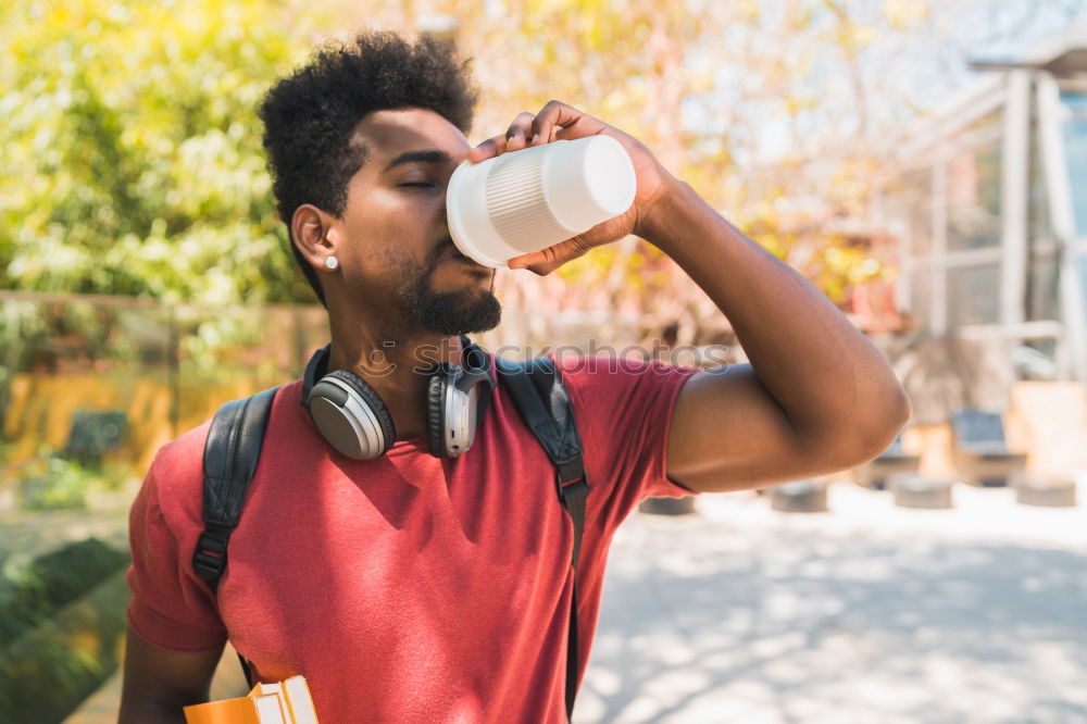 Similar – Young handsome black man holds a ice cream cone