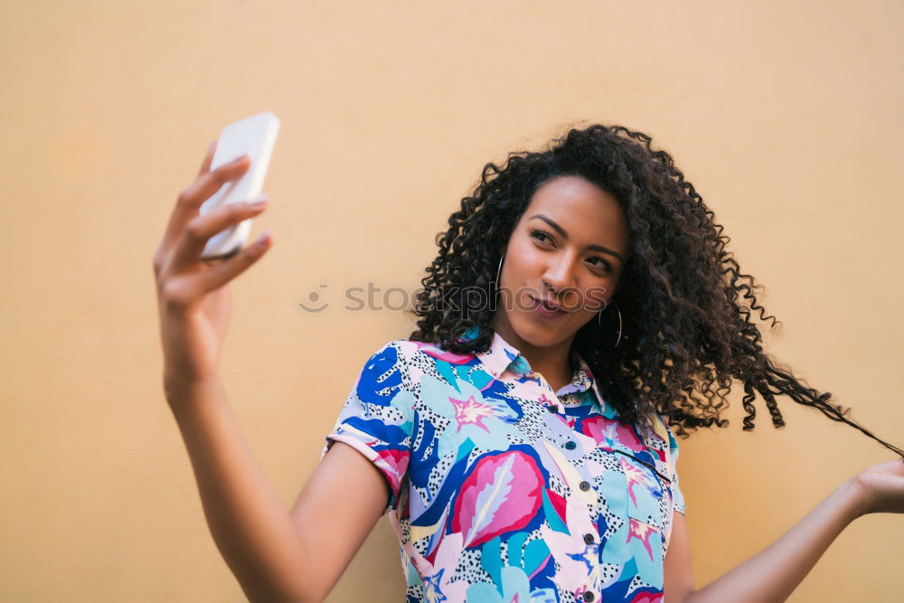 Similar – Front view of a young smiling african american woman standing