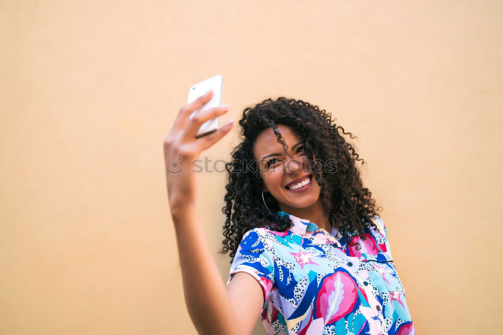 Similar – Image, Stock Photo African young woman taking funny selfie with smartphone