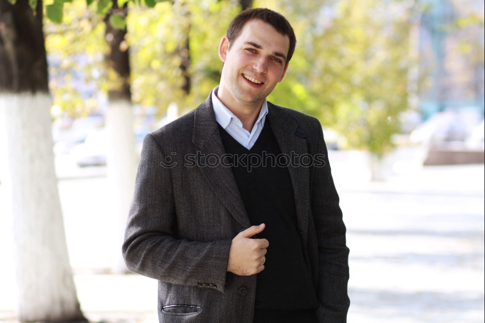 Similar – Young handsome confident fashionable man standing in an urban street