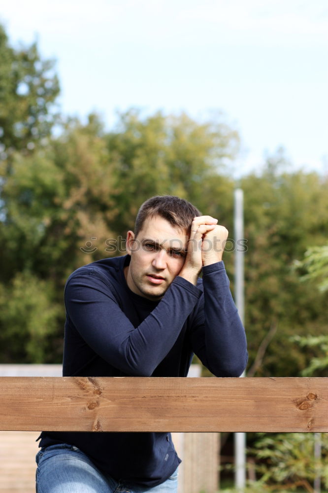 Similar – teenager on fence