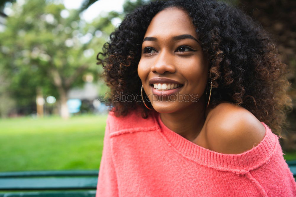 Similar – Image, Stock Photo Mixed woman with afro hairstyle standing in an urban park