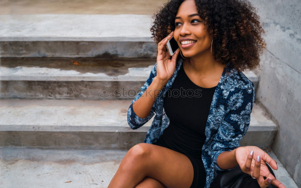 Similar – Image, Stock Photo Portrait of a cheerful young african woman standing outdoors