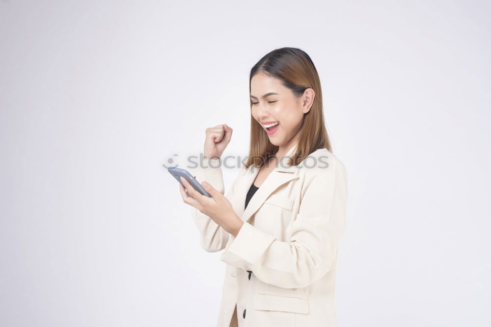 Similar – Image, Stock Photo Happy young woman on the tablet by the wall