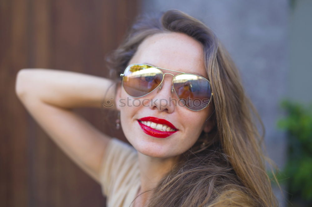 Similar – Cheerful brunette woman lying in grass