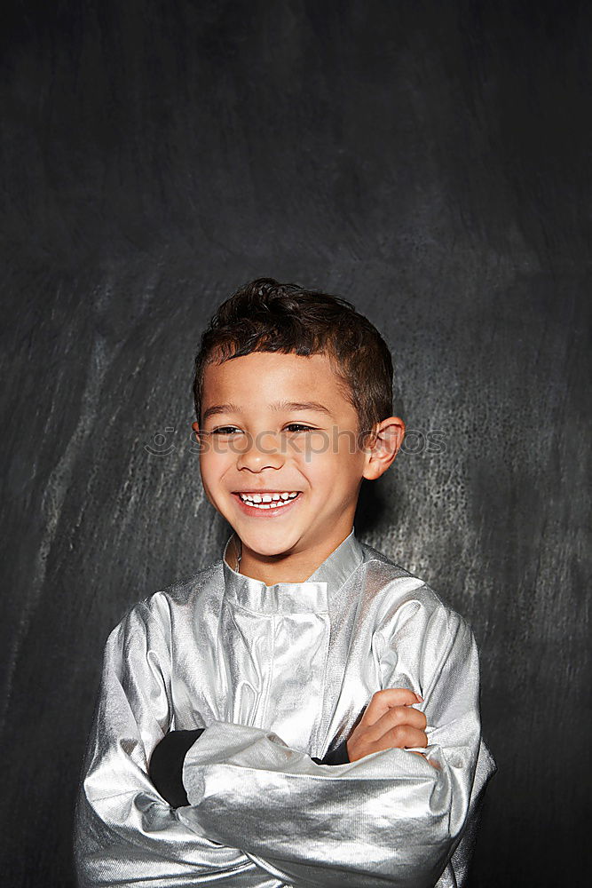 Similar – Child stands in a shower of confetti