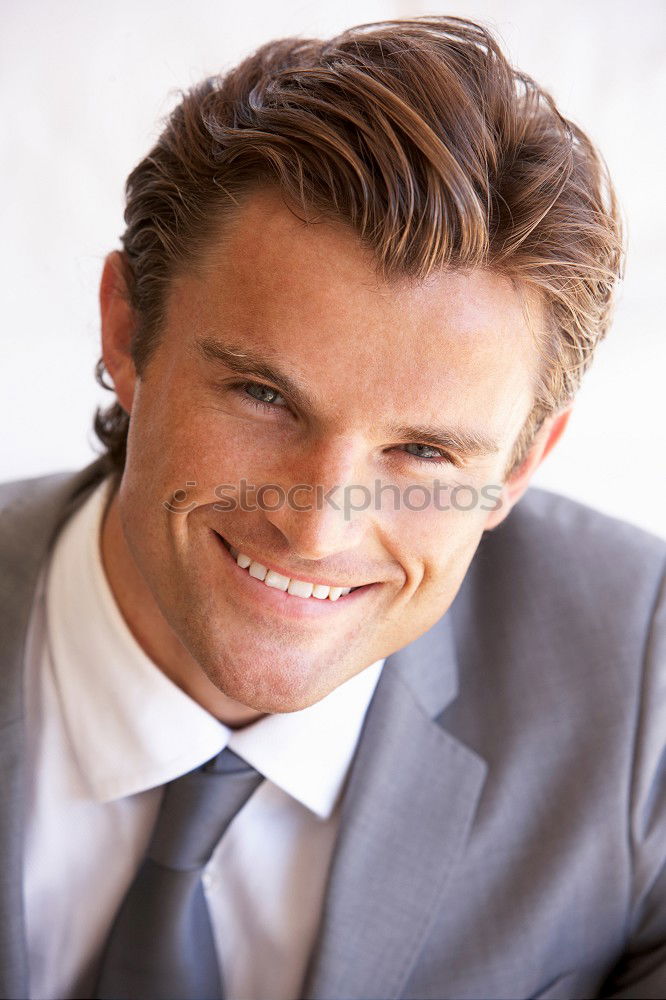 Similar – Businessman in urban background wearing blue suit