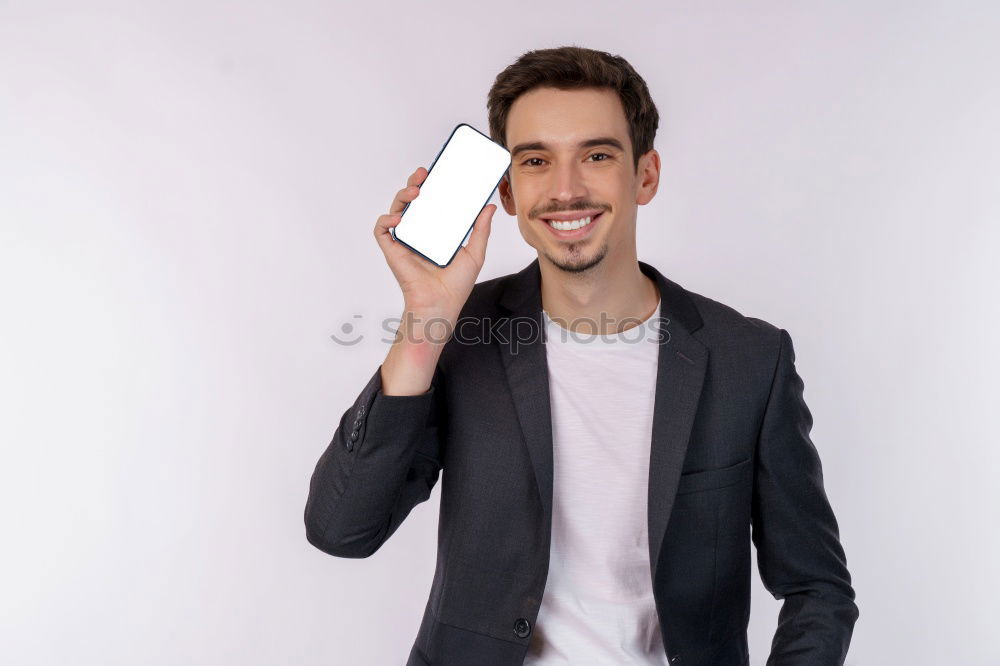 Similar – Portrait of a man showing a blank card.