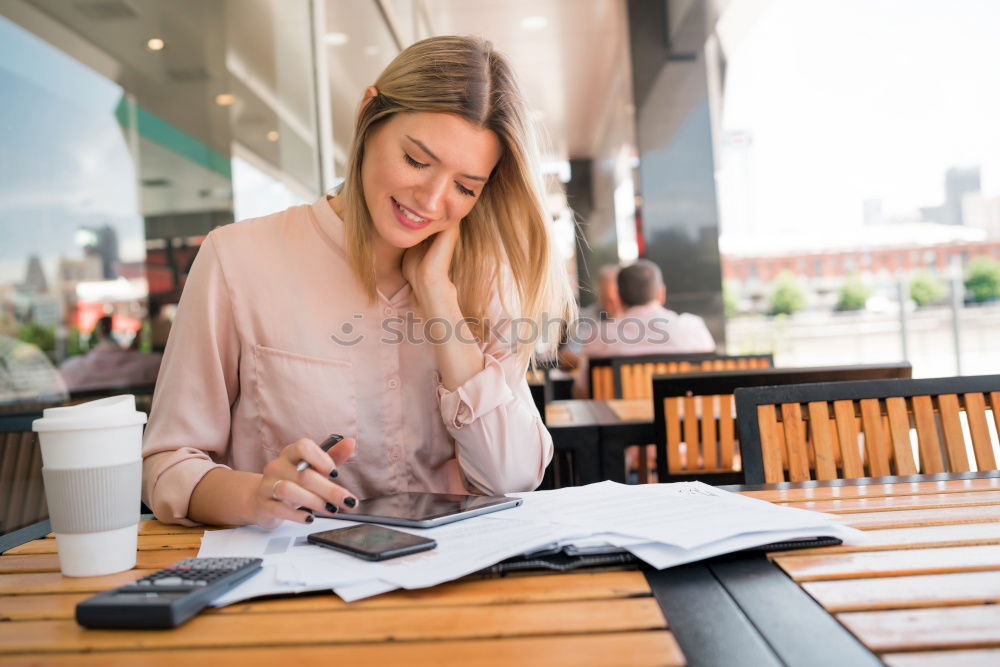 Similar – Image, Stock Photo Young beautiful woman with laptop , smartphone and coffee in a Restaurant