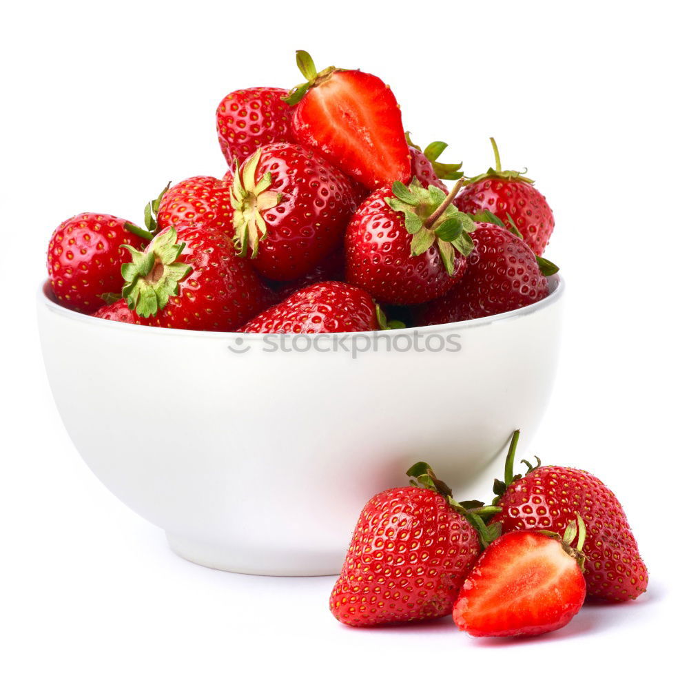 Similar – Strawberries whole and cut on a white wooden table