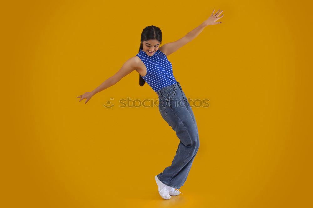 Similar – Young woman dancing in studio