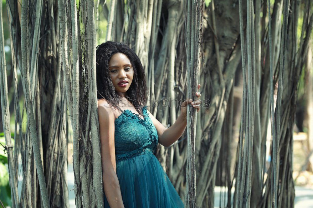 Similar – Gorgeous black woman in dress on street