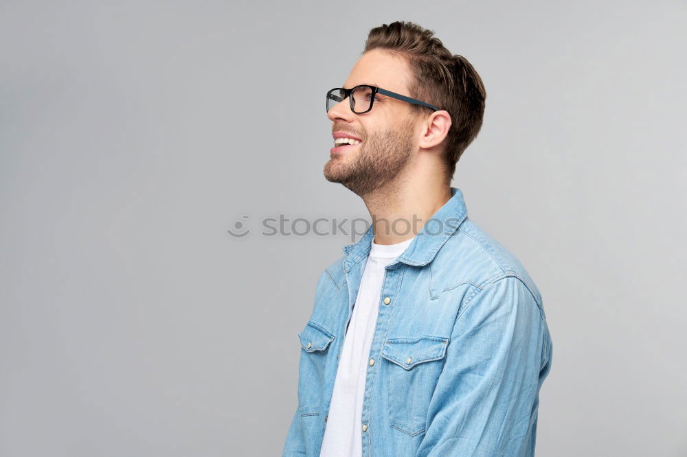 Similar – Image, Stock Photo Young guy with modern hairstyle standing looking away