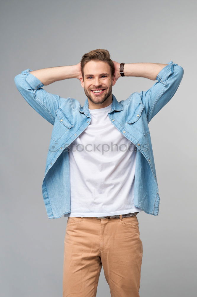 Image, Stock Photo Casual man showing biceps at street