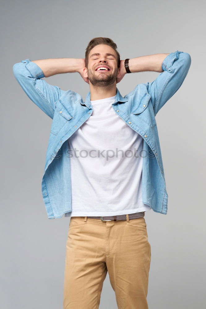 Similar – Image, Stock Photo Handsome caucasian young man in casual clothes in urban environment