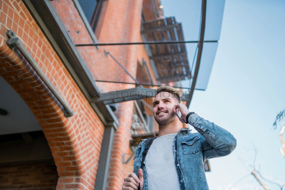 Image, Stock Photo Young man with mobile phone and fixed gear bicycle.