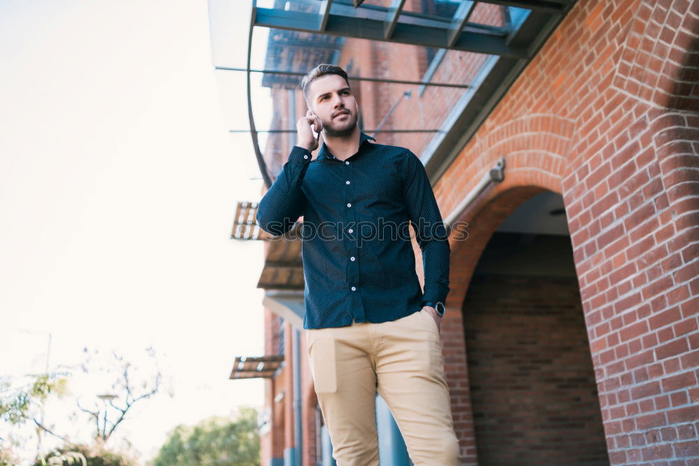 Similar – Image, Stock Photo Modern young man with mobile phone in the street.