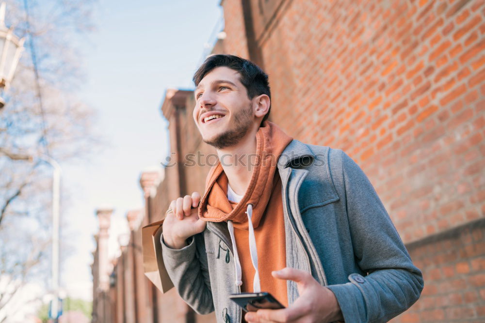 Similar – Image, Stock Photo Young man with mobile phone and fixed gear bicycle.