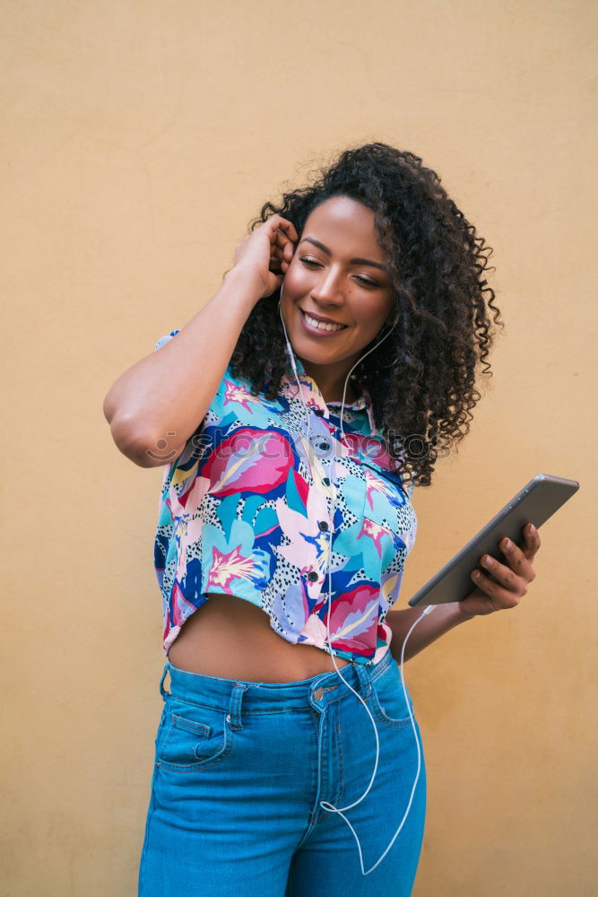 Similar – Image, Stock Photo Smiling woman looking at her smart phone outdoors