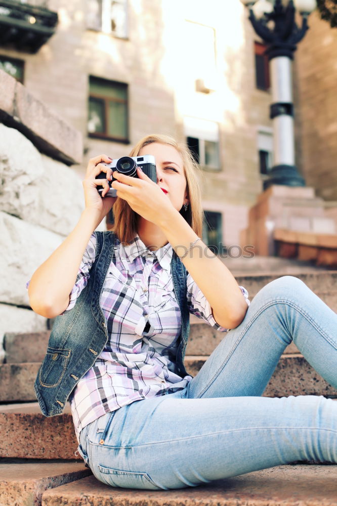 Similar – Image, Stock Photo Woman taking photographs with an old camera