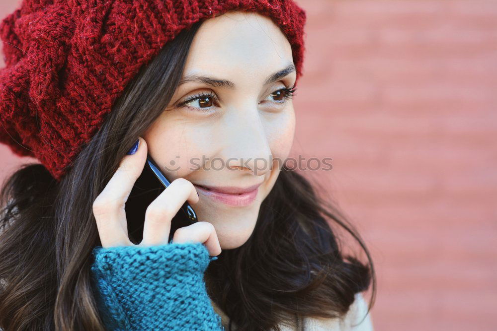 Similar – Smiling Woman in Autumn Fashion Talking on Phone