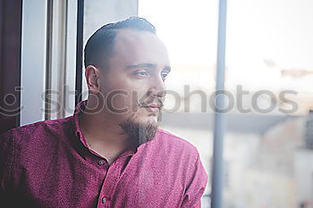 Similar – Image, Stock Photo Confident attractive mulatto man smoking a cigarrette