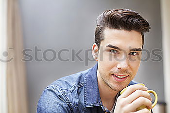 Similar – Young man smiling in urban background