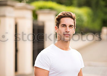 Similar – Man sitting in a bench on a beautiful maroon background