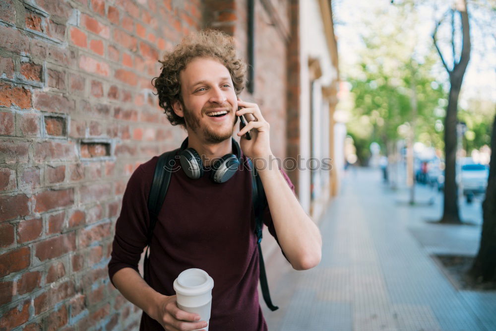 Similar – Image, Stock Photo Young man waiting listening music and using mobile phone at the airport with a suitcase.