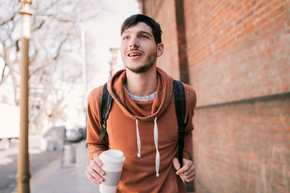 Similar – Young man wearing winter clothes in the street.