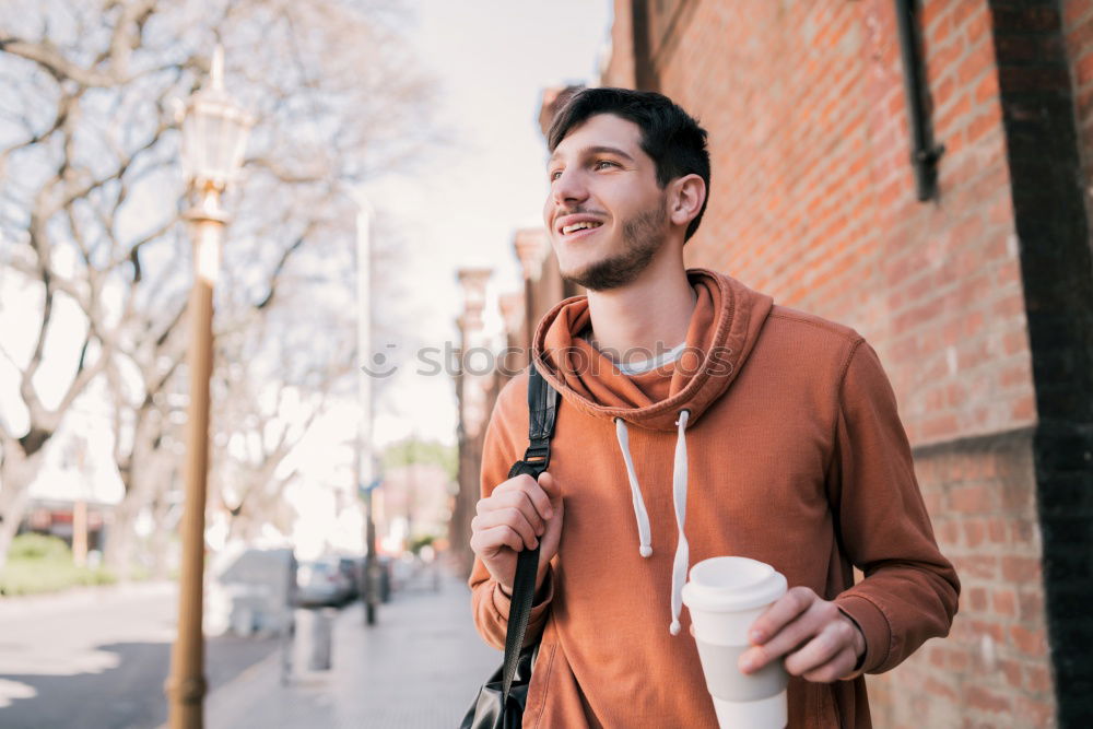 Similar – portrait of a happy man use his phone in the market