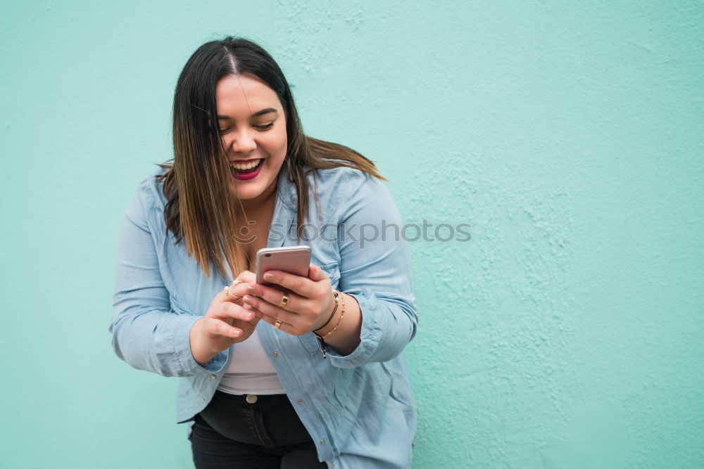 Image, Stock Photo Young beautiful woman in yellow dress using mobile phone